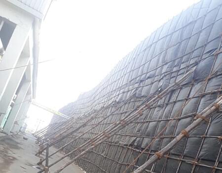 Tarpaulin wall by Shah Shivji Valji & Co.